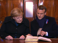 Macron and Merkel in rail car